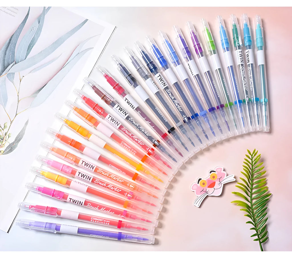 Set of calligraphy art marker pens with brush tips in multiple colours for hand lettering and drawing