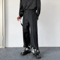 Pleated wide leg straight pants black cotton blend with elastic waist on mannequin