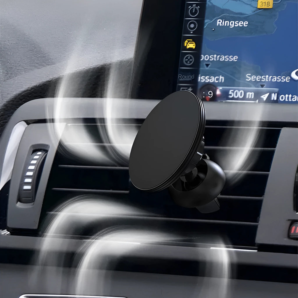 Black aluminium alloy magnetic car air vent phone holder mounted on vehicle dashboard