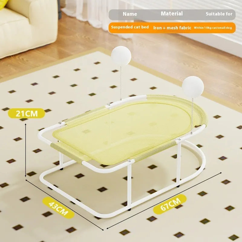 Large grey fabric kennel cage bed for a cat resting inside.