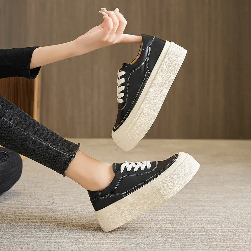 Women's black platform casual shoes with embossed cowhide leather upper and rubber sole