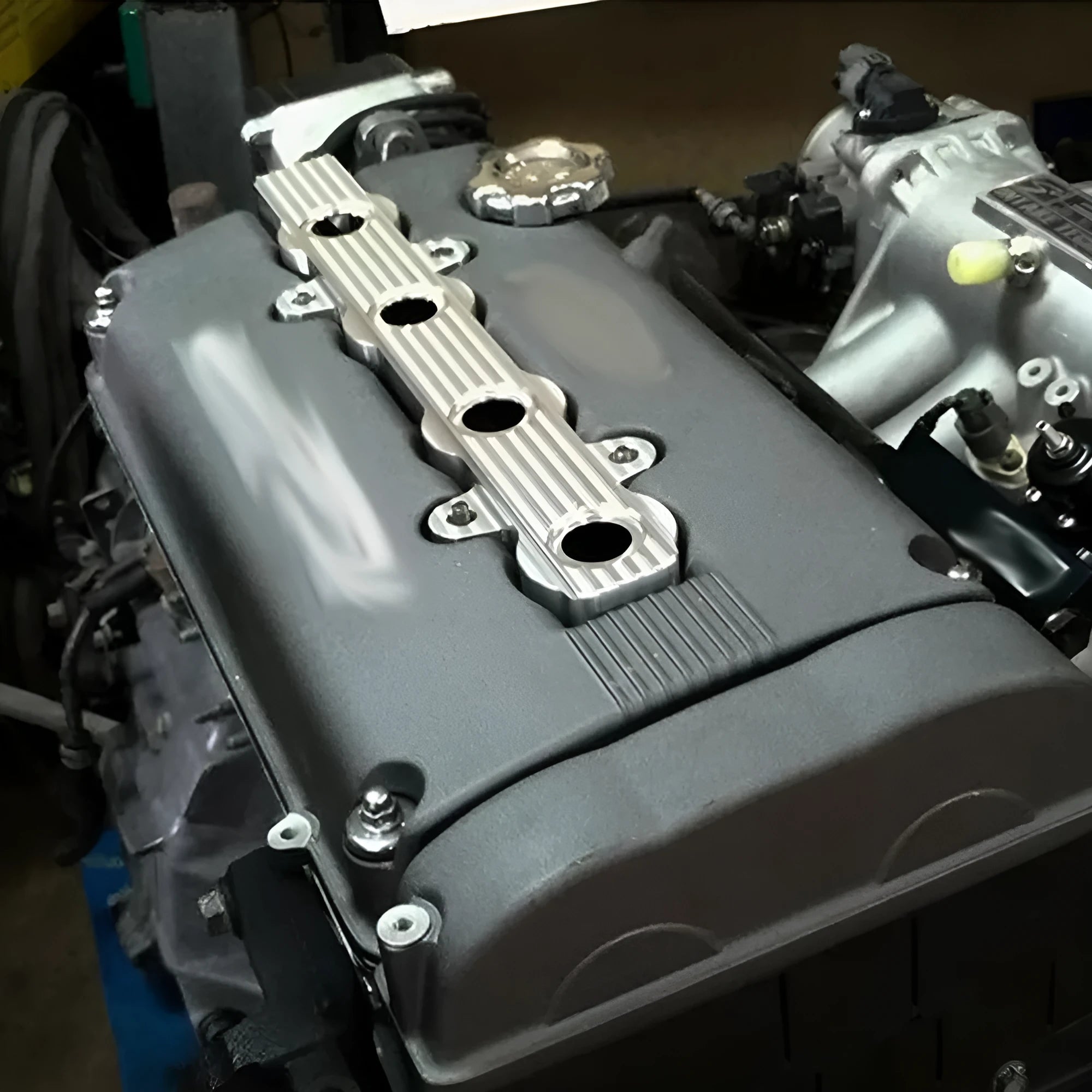 Aluminium alloy car engine hood shield shown in blue, red, and silver, with and without vent holes.