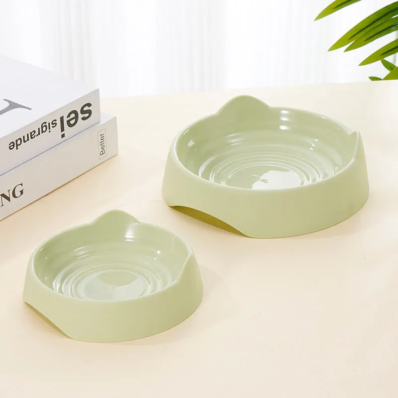 Ceramic dog slow feeder bowl with raised maze pattern in blue, green, or pink colours