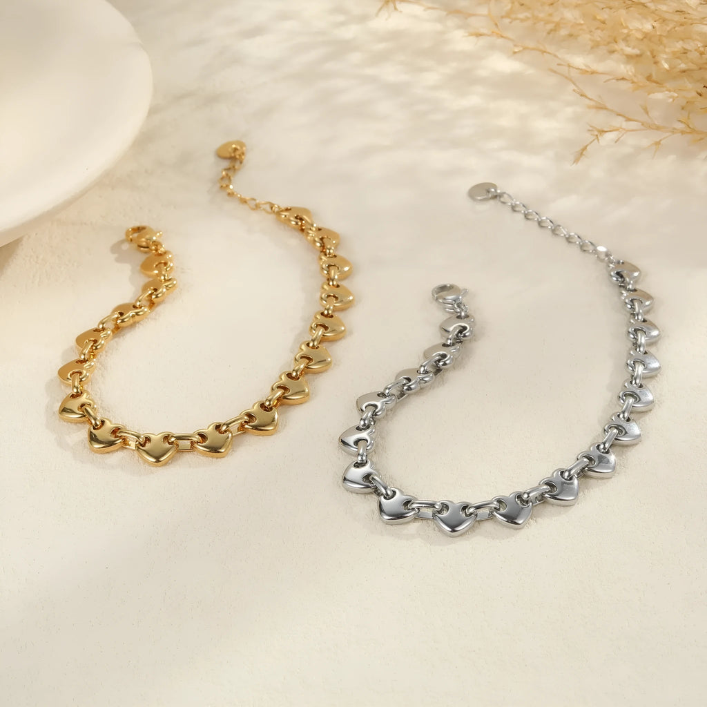 Women's hollowed-out heart bracelet in stainless steel with 18K electroplating geometric design