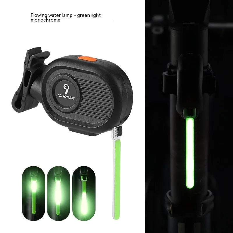 Bicycle running water taillight showing a blue waterfall LED light effect mounted on a bike seat post.