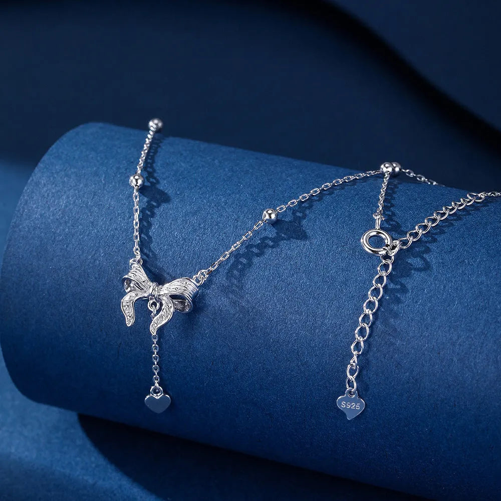 S925 silver butterfly heart necklace with adjustable O-ring chain and bow detailing