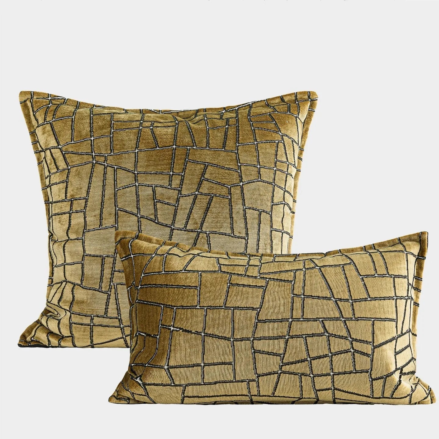Gold geometric abstract pattern on a square polyester cushion cover with feather velvet pillow insert.