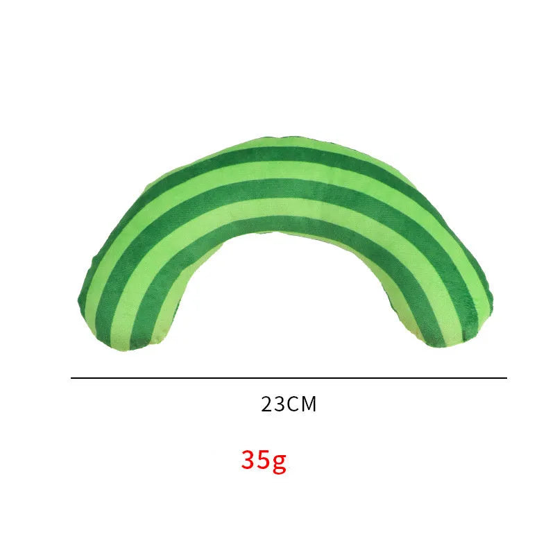 Set of four cat toys including a noise maker and a green striped catnip pillow on a neutral background.
