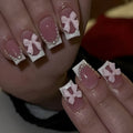 Short French manicure nail art set with multiple patterns including tulips, bows, starry sky, leopard print and XINGX designs