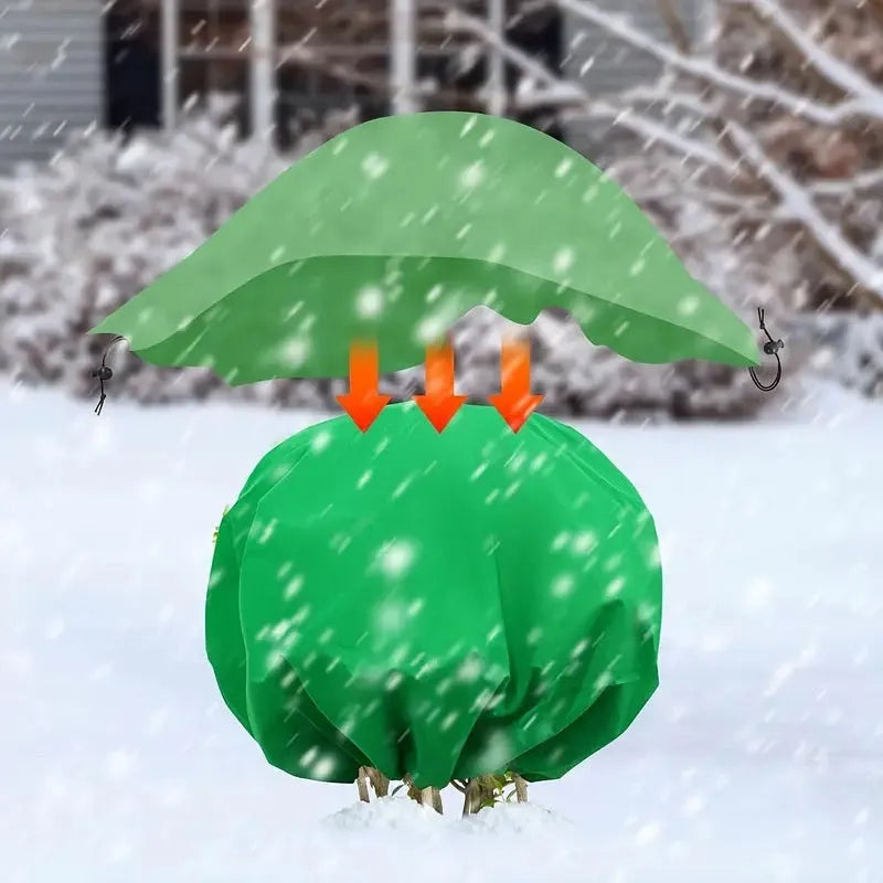Round green non-woven plant frost cover with drawstring resting on grass, showing 1.9m diameter size