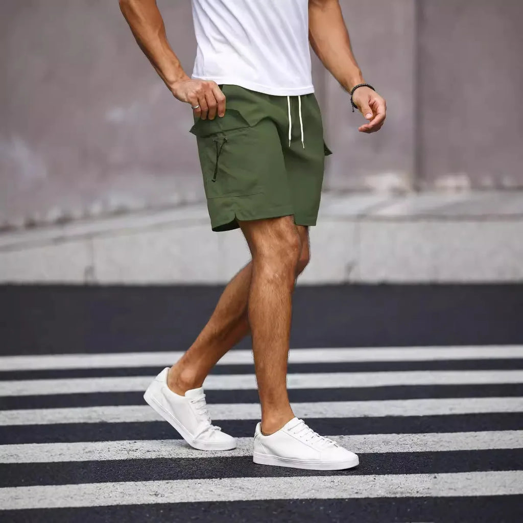 Men's loose fit workwear shorts in army green and fluorescent green colours with straight leg street style design