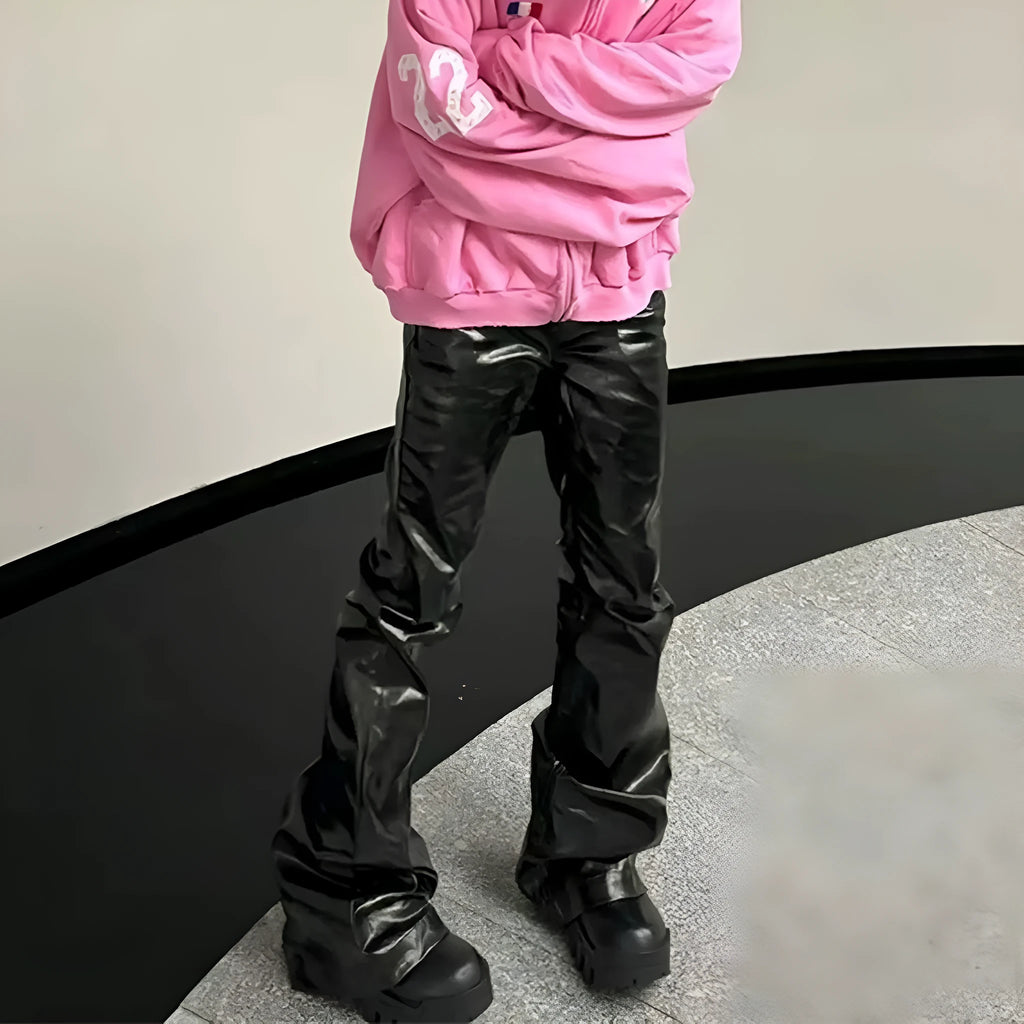 Black coated shiny patent leather skinny jeans in a straight-leg style on a mid waist.