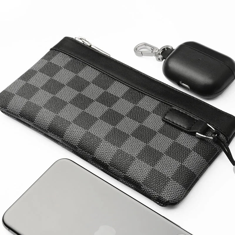 Black men's clutch wallet made of genuine cowhide leather, showing front view.