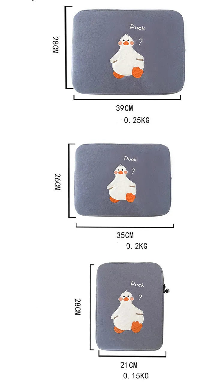 Blue cotton tablet case with embroidered cartoon duck design and a zipper, shown next to a green version.