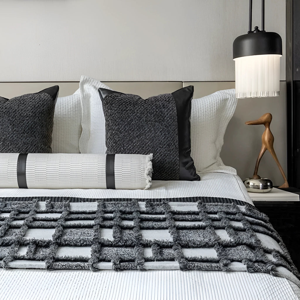 Modern minimalist grey and white plaid bed runner blanket set with leather round pillow on a 1.5m bed.
