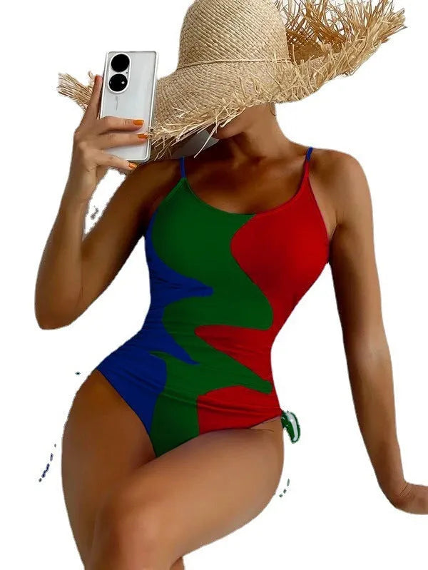 Women's sleeveless one-piece swimsuit in blue, purple, brown or green with fixed swimming trunks