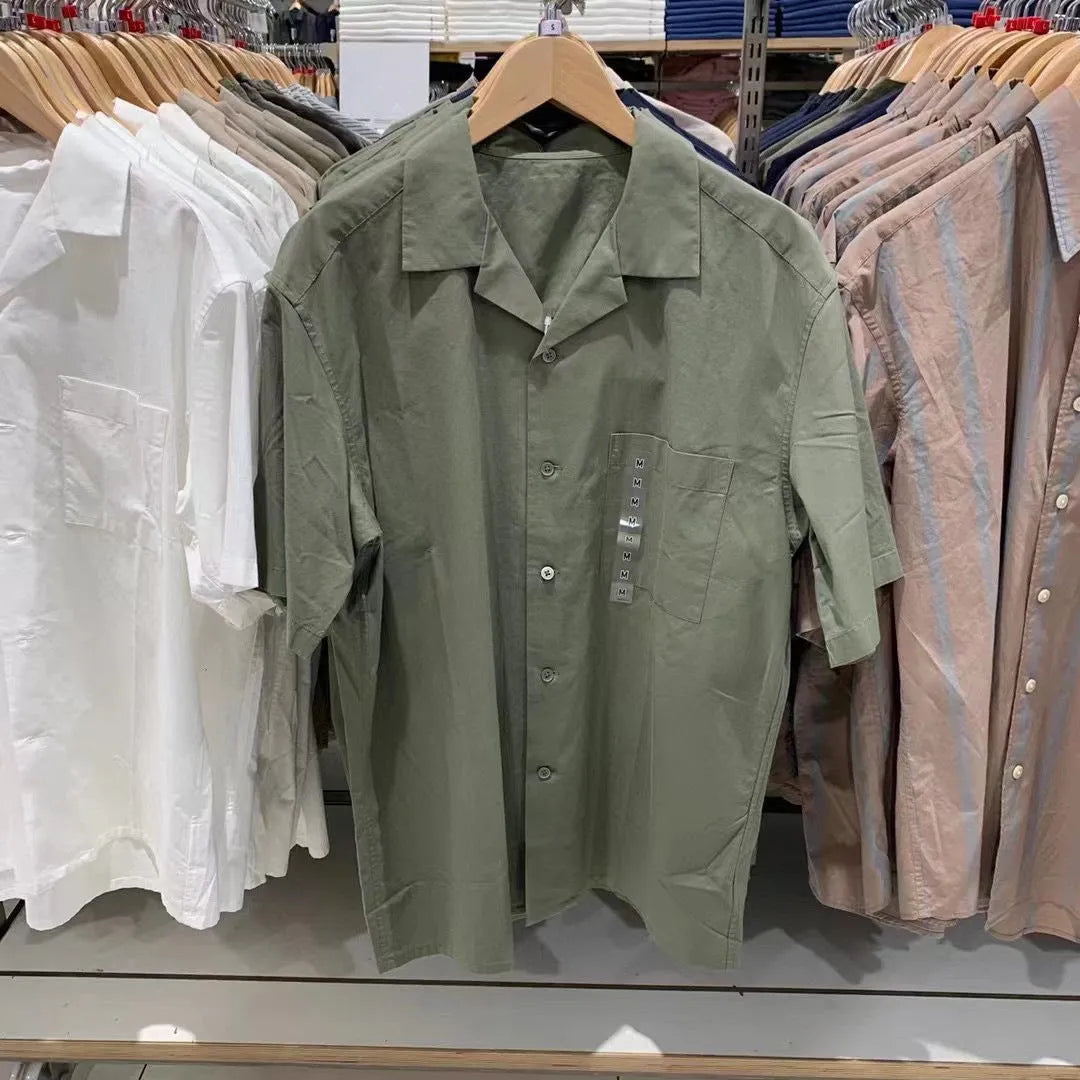 Man wearing a beige open collar casual shirt made from a cotton modal blend with Japanese styling