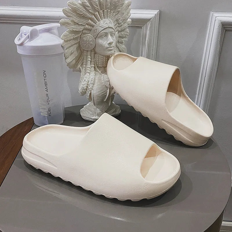 Women's thick sole beach slippers in four colour options with injection moulded EVA construction