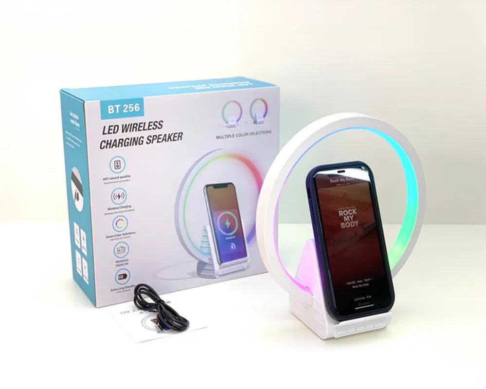 White smart Bluetooth speaker with wireless charging pad and ambient lighting, measuring 225x200x10mm