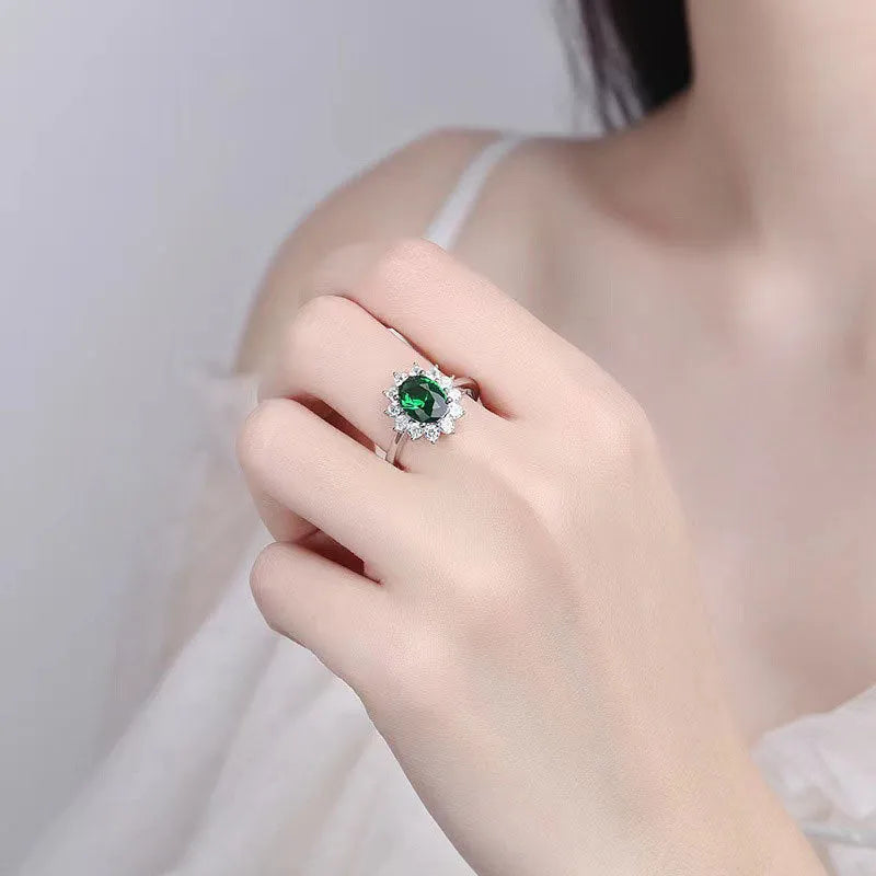 Women's copper ring with flower shape and zirconium inlay, electroplated finish in green, sapphire blue, or pomegranate red.
