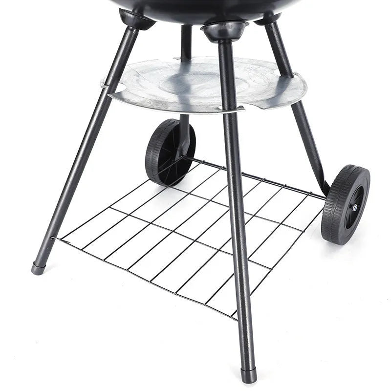 Portable iron barbecue grill with a 14-inch circular cooking grate.