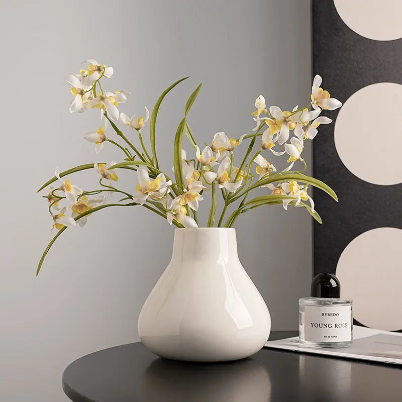 Ceramic decorative vase with round belly French design in black or white colour options