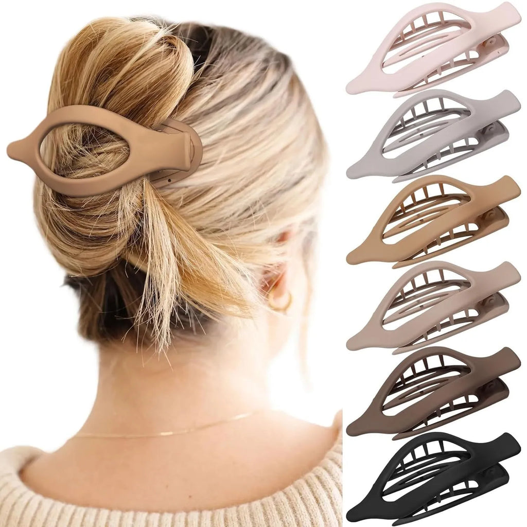 Set of six nude-coloured plastic hair clips with a quadrilateral shape and frosted grip.