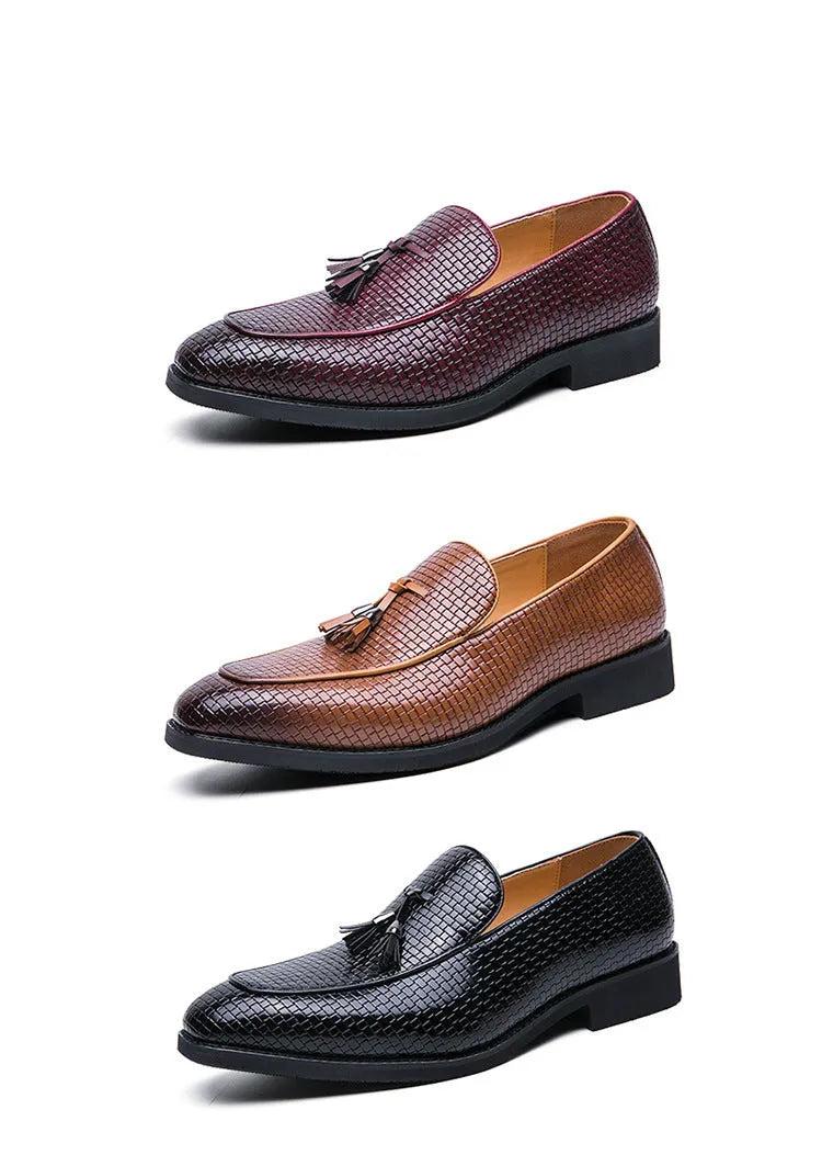 Men's black slip-on business shoes with pointed toe and tassel detail on artificial PU upper
