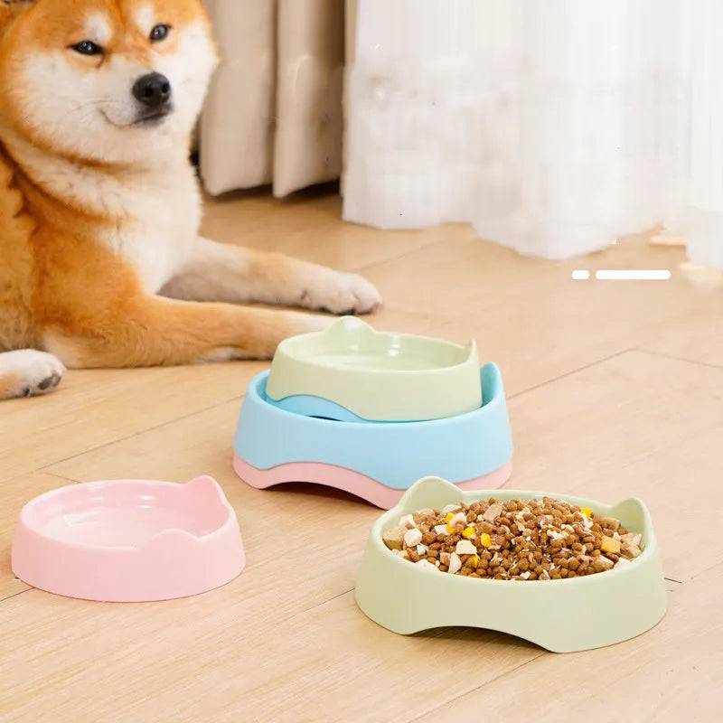 Ceramic dog slow feeder bowl with raised maze pattern in blue, green, or pink colours