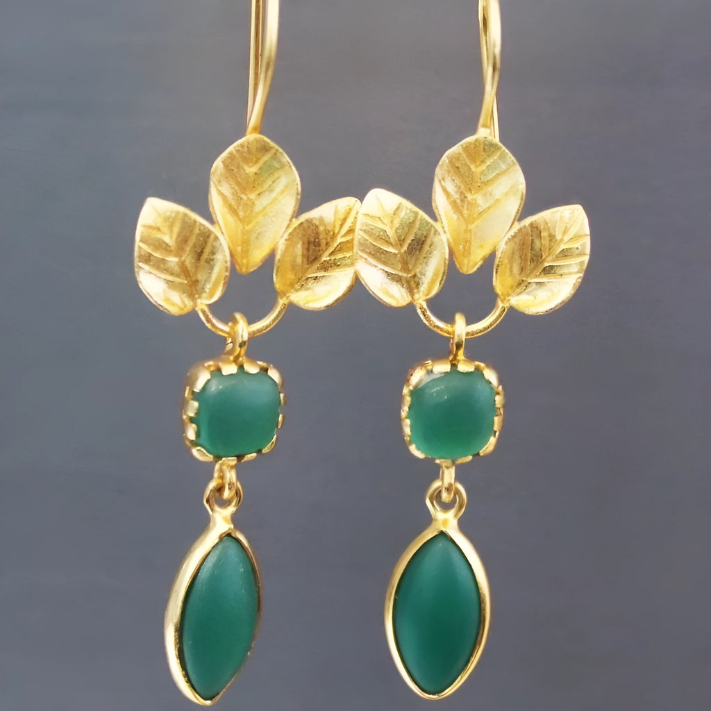 Gold drop earrings with French leaves design, zircon stones, and chain tassels