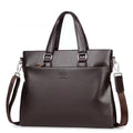 Men's black PU leather messenger bag with splicing design and crossbody strap