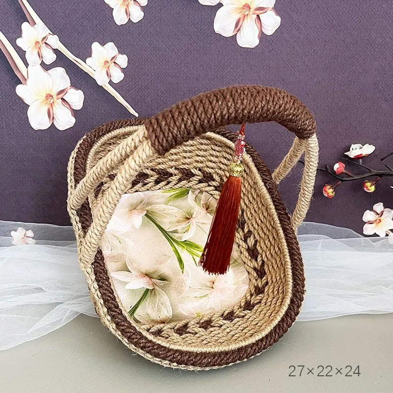 Hand-woven straw basket with hemp rope detailing in coffee brown colour