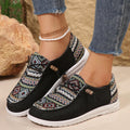 Women's low-top flat slip-on shoes in black, dark grey, or khaki with a round toe and rubber sole.