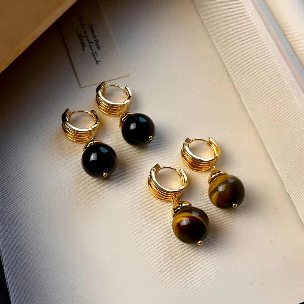 Geometric round tigereye stone earrings for women with gold plating in black and brown.