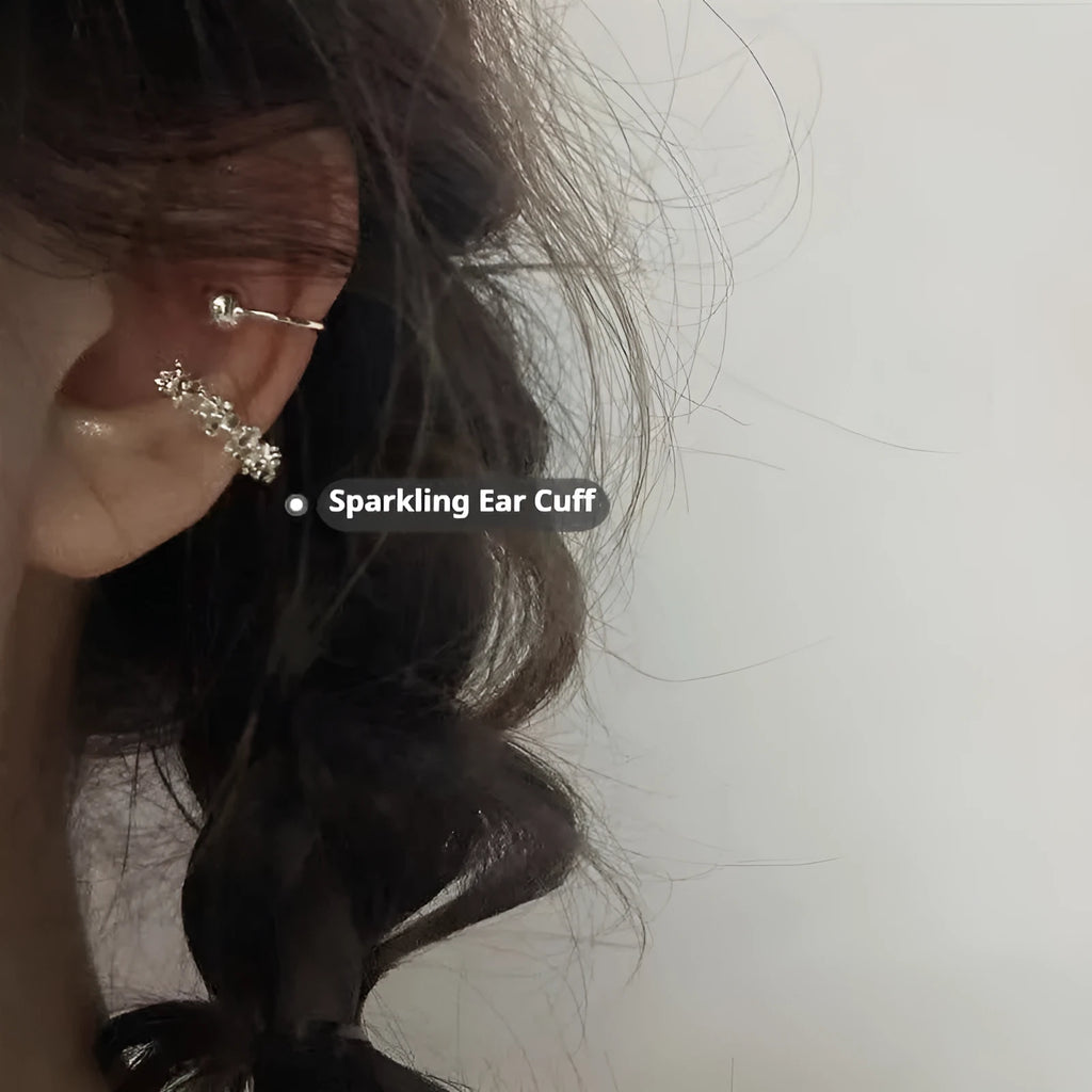 A pair of geometric irregular-shaped alloy earrings with a frosty finish and clip-on fastenings.