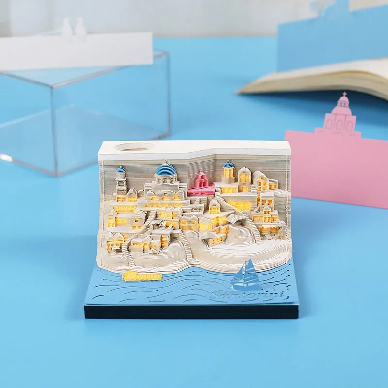 Santorini 3D notepad paper carving building model with 166 pages on desk