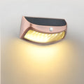 Solar outdoor smiling face wall lamp for garden decoration with IP65 waterproof rating