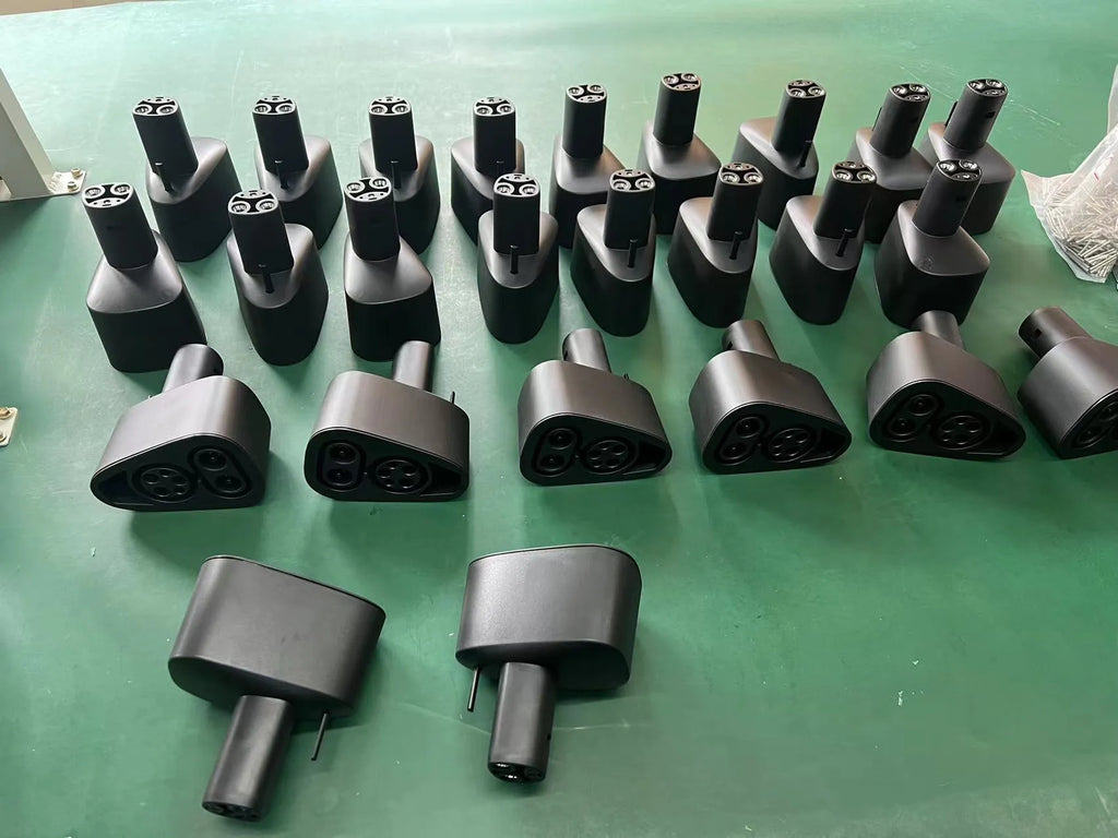 Black Tesla to American Standard charging plug conversion adapter for electric vehicles