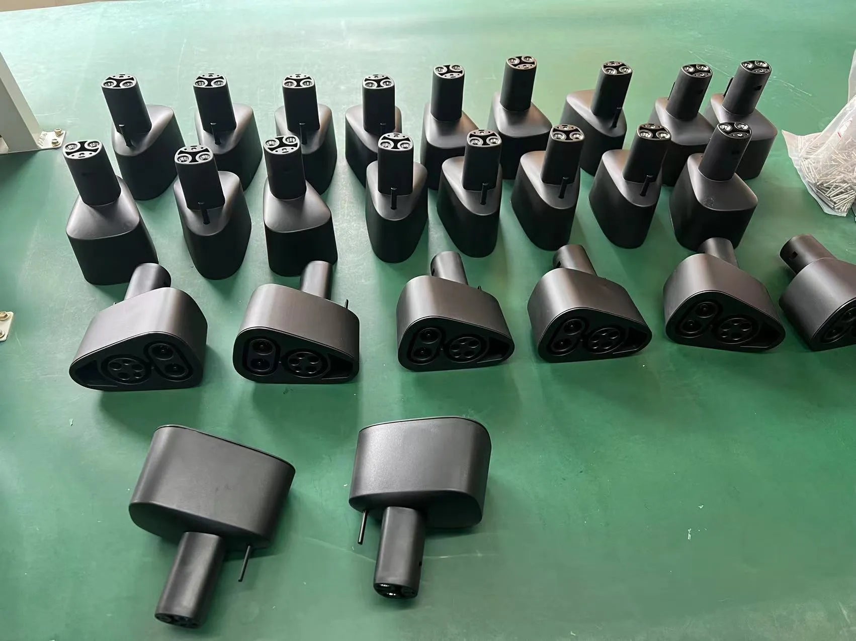 Black Tesla to American Standard charging plug conversion adapter for electric vehicles