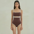 Brown triangle one-piece swimsuit for women on a hanger, showing sexy style and nylon fabric.