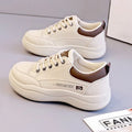 Women's white Korean-style lace-up shoes with cross-strap detailing and round toe
