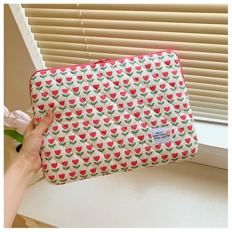 Women's floral print laptop bag in cloth material with anti-shock padding