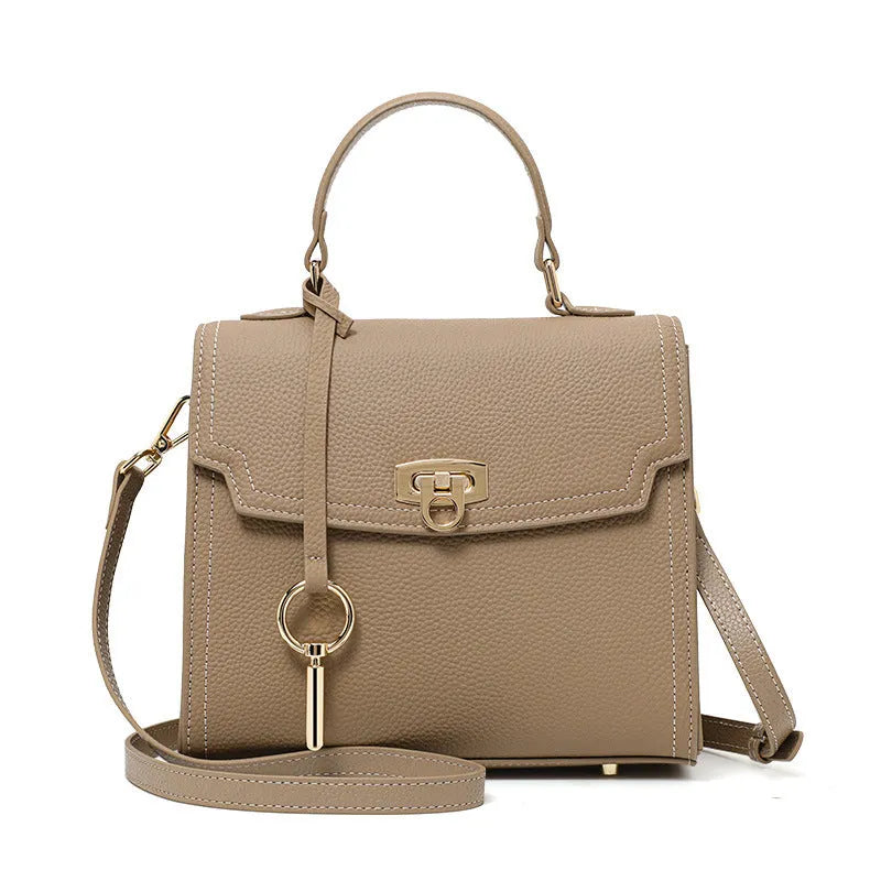 Elephant grey square genuine leather handbag with a vintage lock and textured litchi pattern.