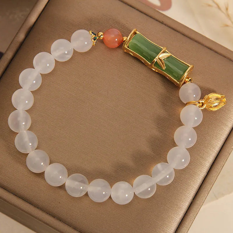 Women's Chinese style bamboo beaded bracelet with white agate jasper charm and natural jade materials