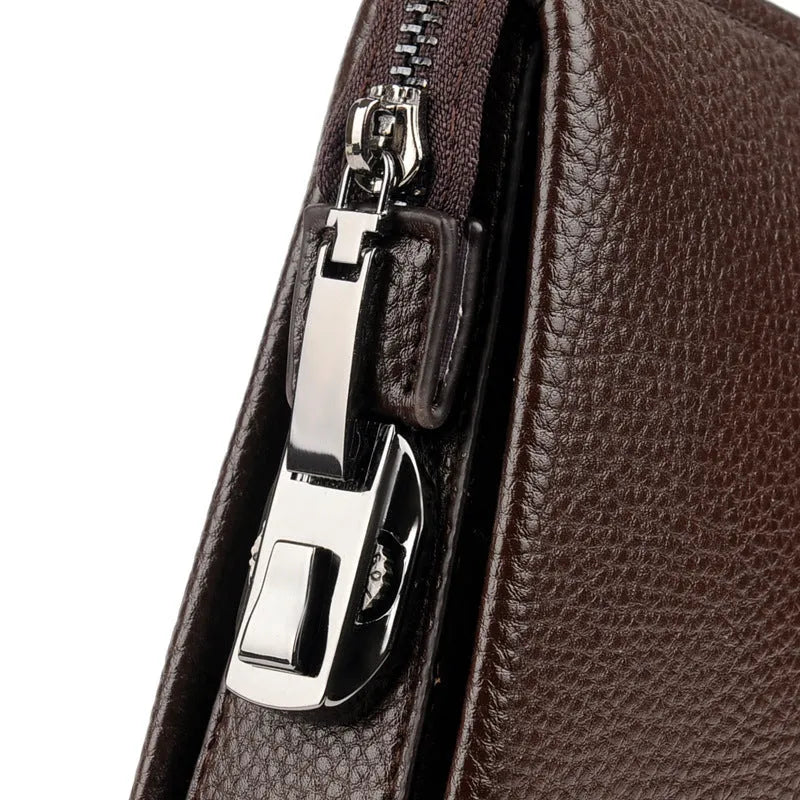 Men's business casual clutch made of soft PU leather, black, with visible sewing line detail and anti-theft design