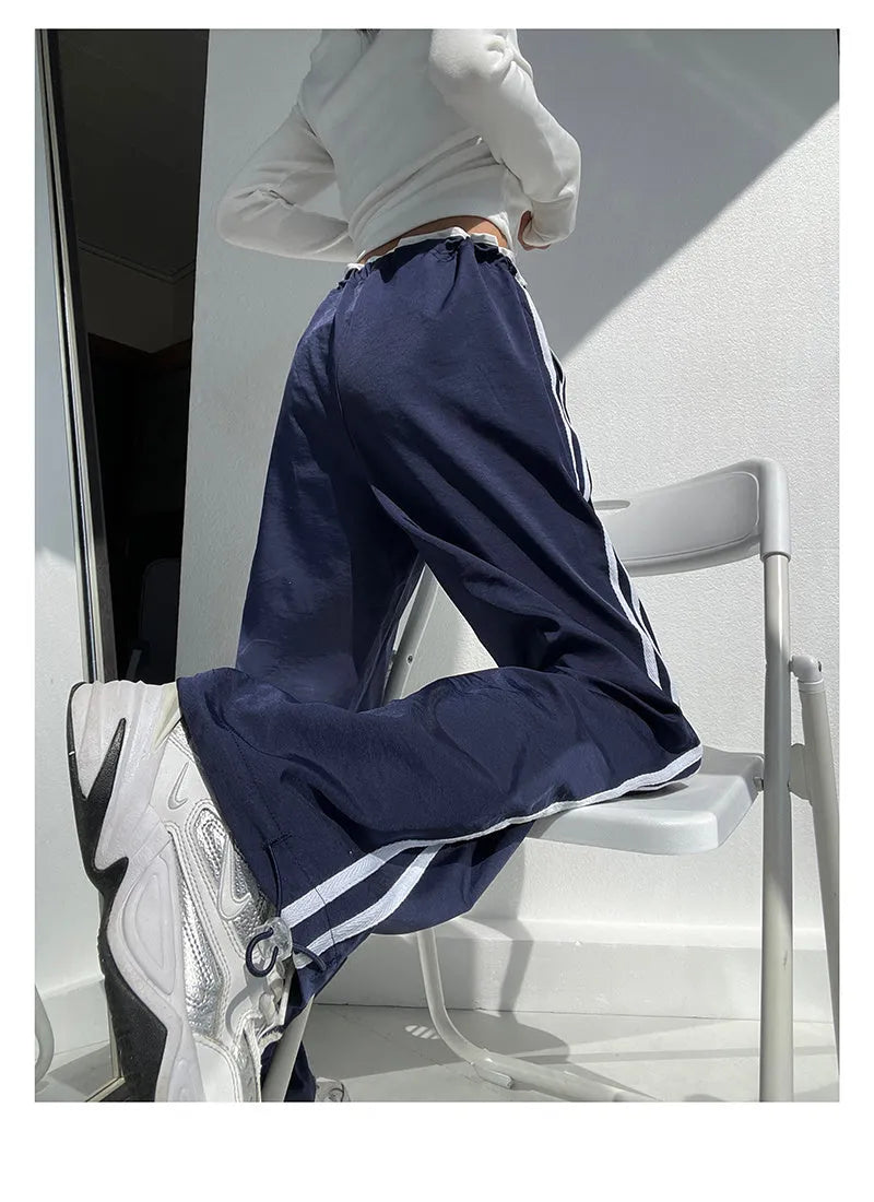 Women's navy blue trousers with white contrast ribbon parallel bar detailing, low-waist straight-leg design