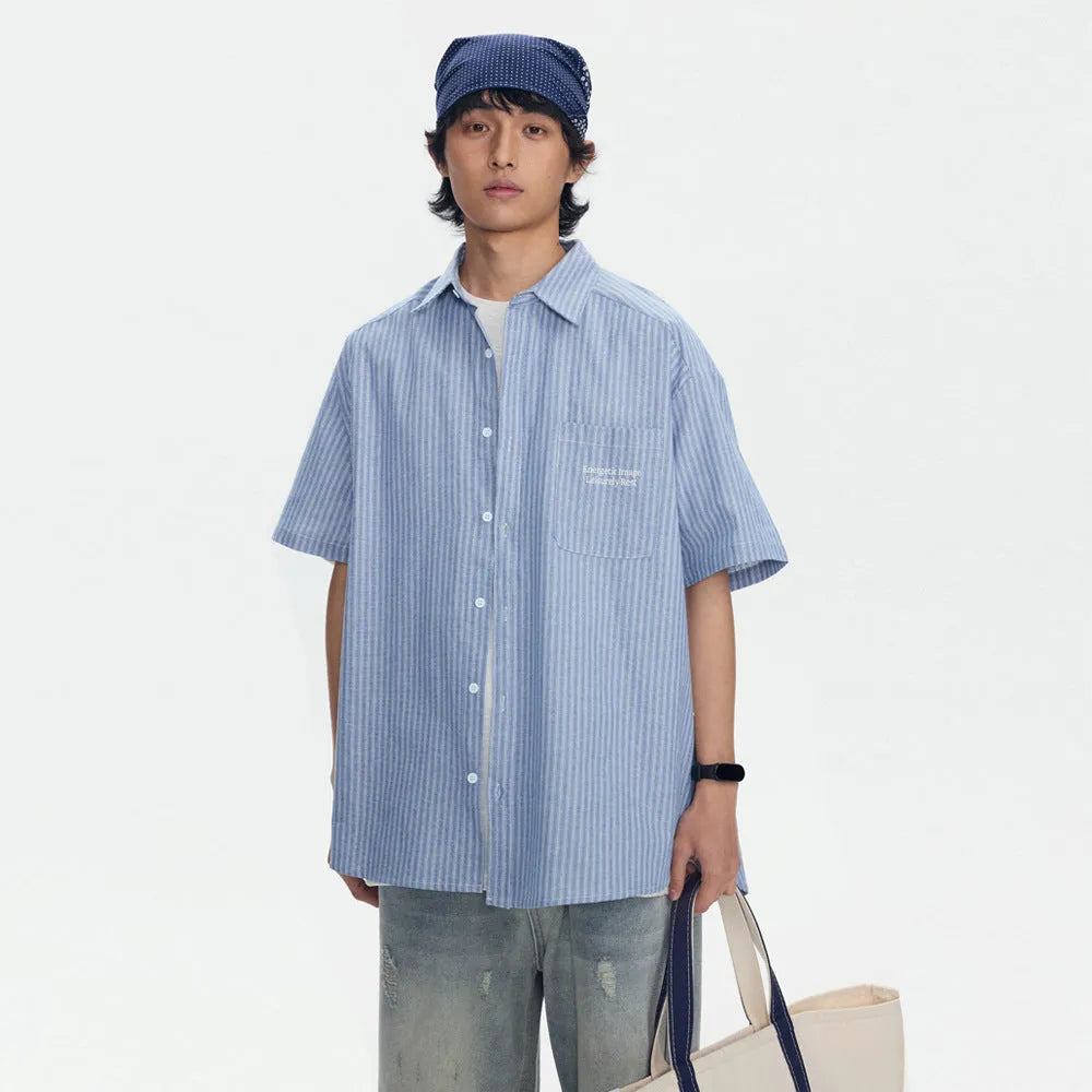Blue striped short-sleeved overall shirt with cardigan style in cotton blend fabric