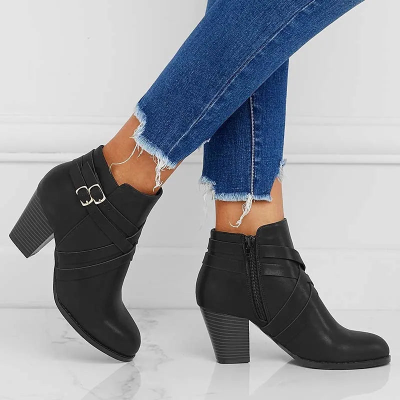 Plus size women's grey ankle boots with a 7cm heel and side zipper.
