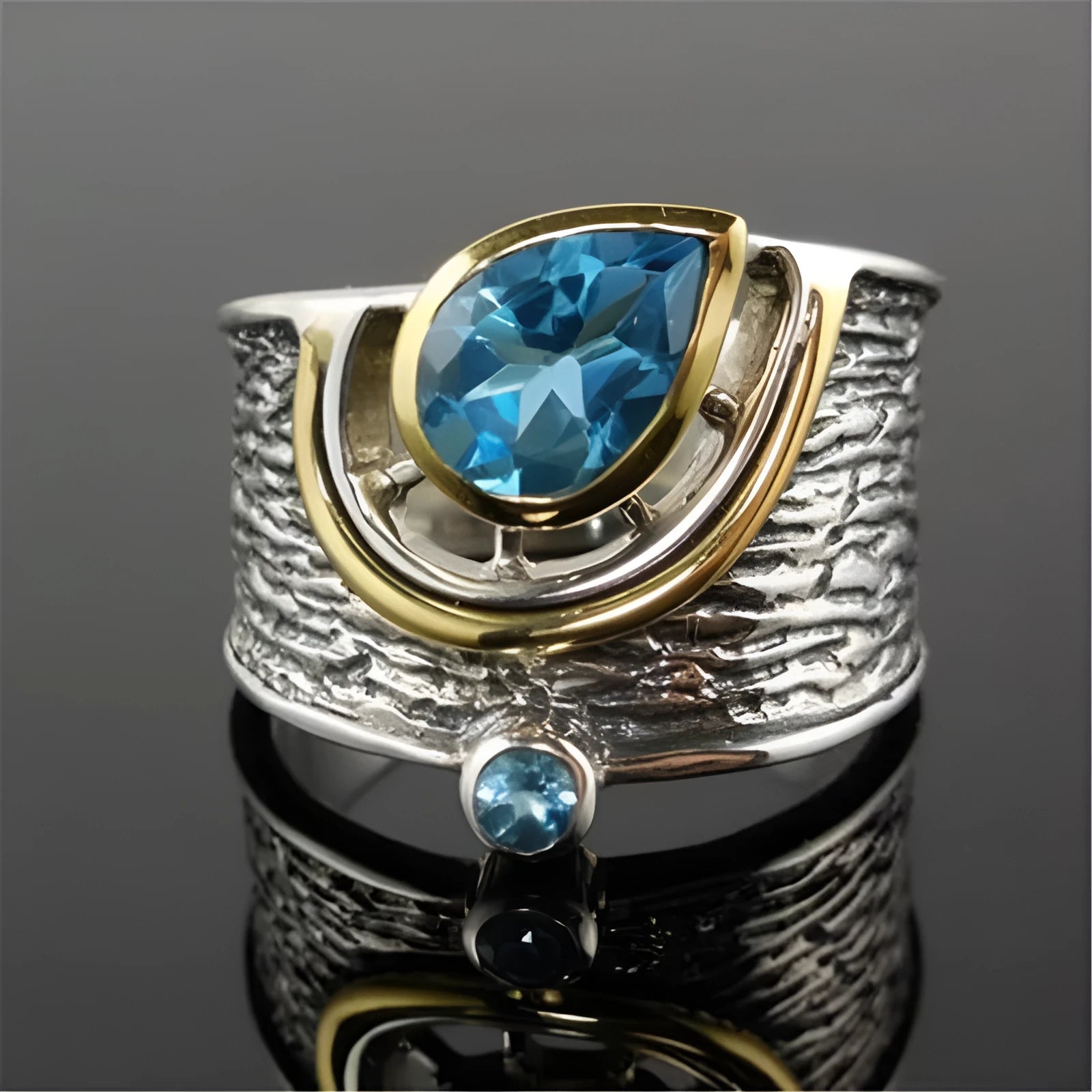 Women's blue zircon ring with Chinese style design and drop shape, shown in alloy.