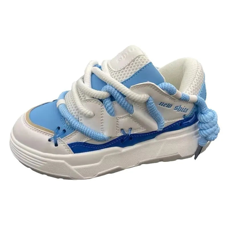 Women's grey retro chunky sneakers with a thick rubber sole and flat 6-8 cm heel.